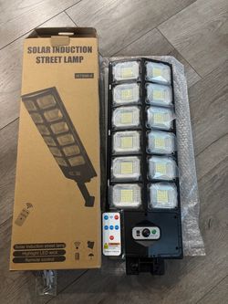 BRAND NEW Solar Outdoor Street Light - Motion Sensor & Remote Control