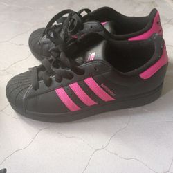 Black and pink Adidas