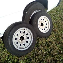 Two 205/75/14" Tires On 14" Galvanized Rims Ok Shape N Hold Air  For  $40 Each Or Both For $75