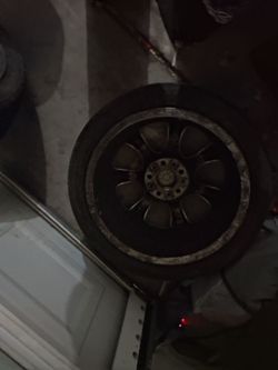 2 TIRES AND RIMS BMW