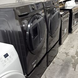 Samsung Frontload washer and dryer set with pedestals