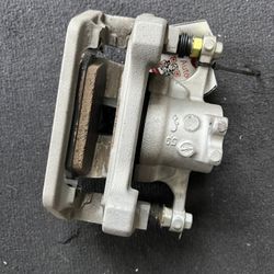 2020 - 2025 TESLA MODEL Y REAR LEFT SIDE DISC BRAKE CALIPER OEM 10(contact info removed)H