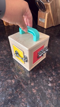 Lovevery toy wooden lock box