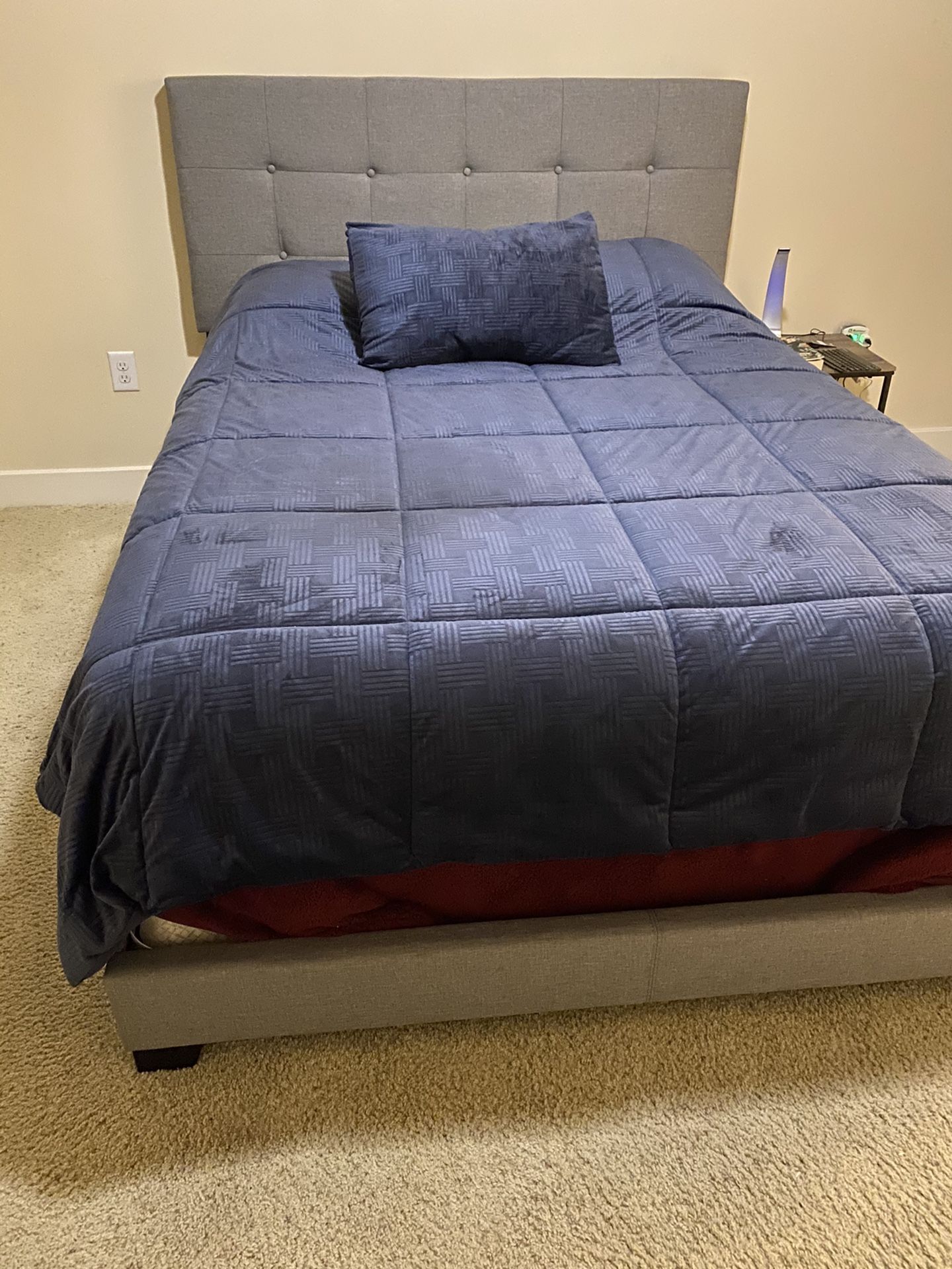 Queen bed frame with mattress and box spring