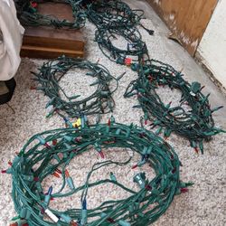 6 Bunches Of Red,Blue, Orange, And Green Christmas Lights