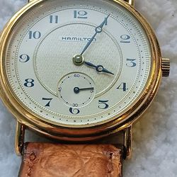 Beautiful Hamilton watch in perfect condition
with a Victorian wallpaper-style 
