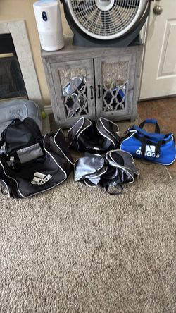 Four Adidas gym bags