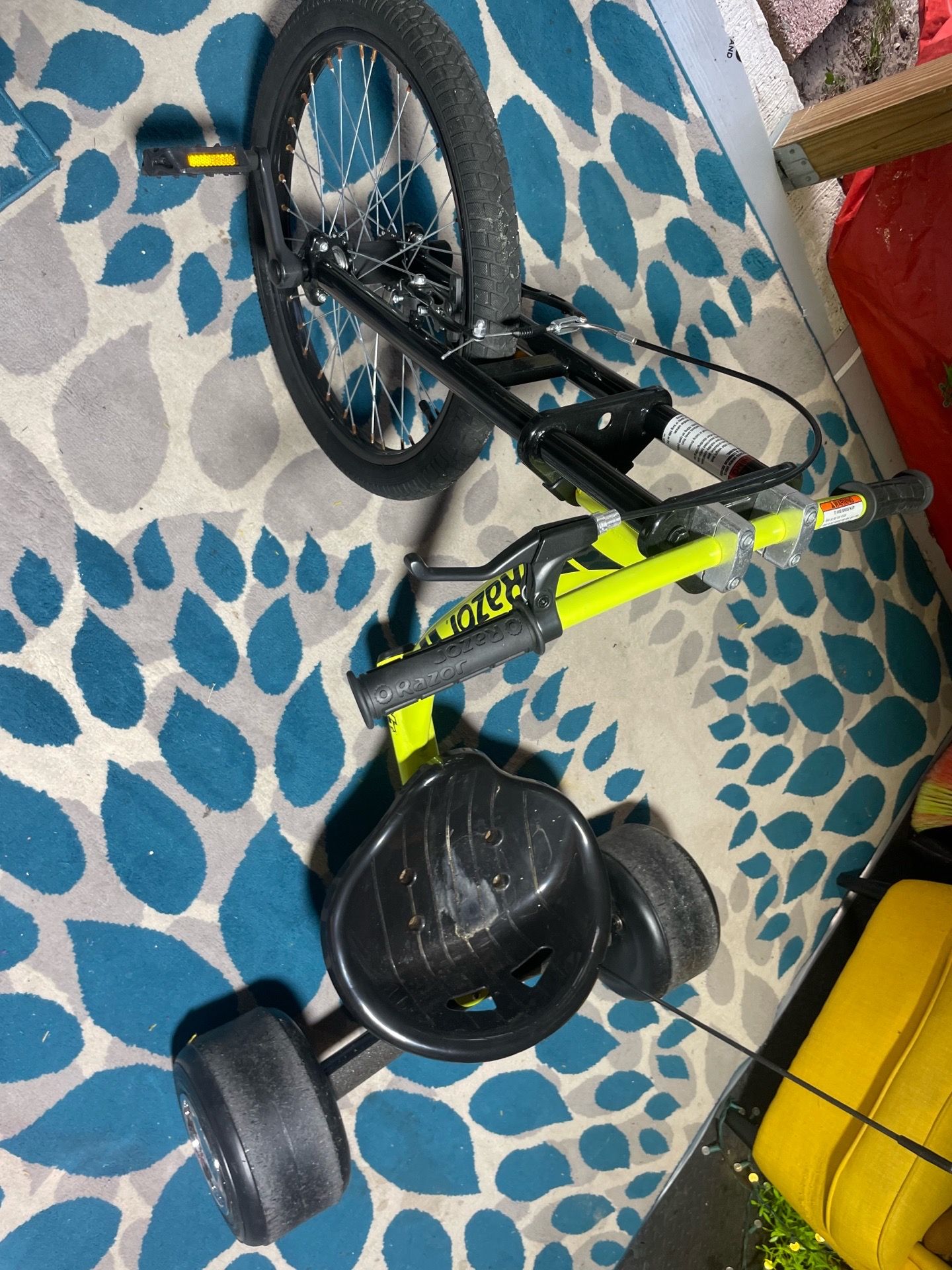 Yellow RAZOR DXT Drift trike designed for downhill action like new