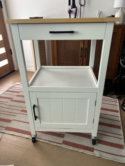 White wood kitchen cart with wheels