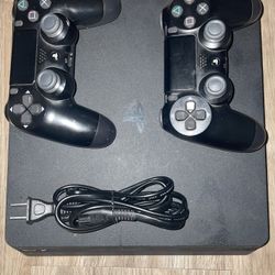 PlayStation 4 Pro w/ 2 Controllers