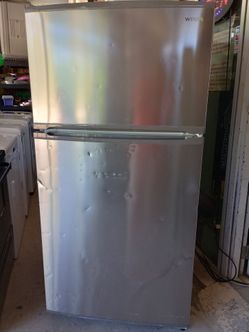Winia stainless steel top freezer refrigerator 21 cu.ft MODEL: WTL21HBSLD