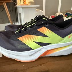 Men 10 2E wide New Balance FuelCell Rebel v4 running shoes  Color way: Black/Graphite/White Peach