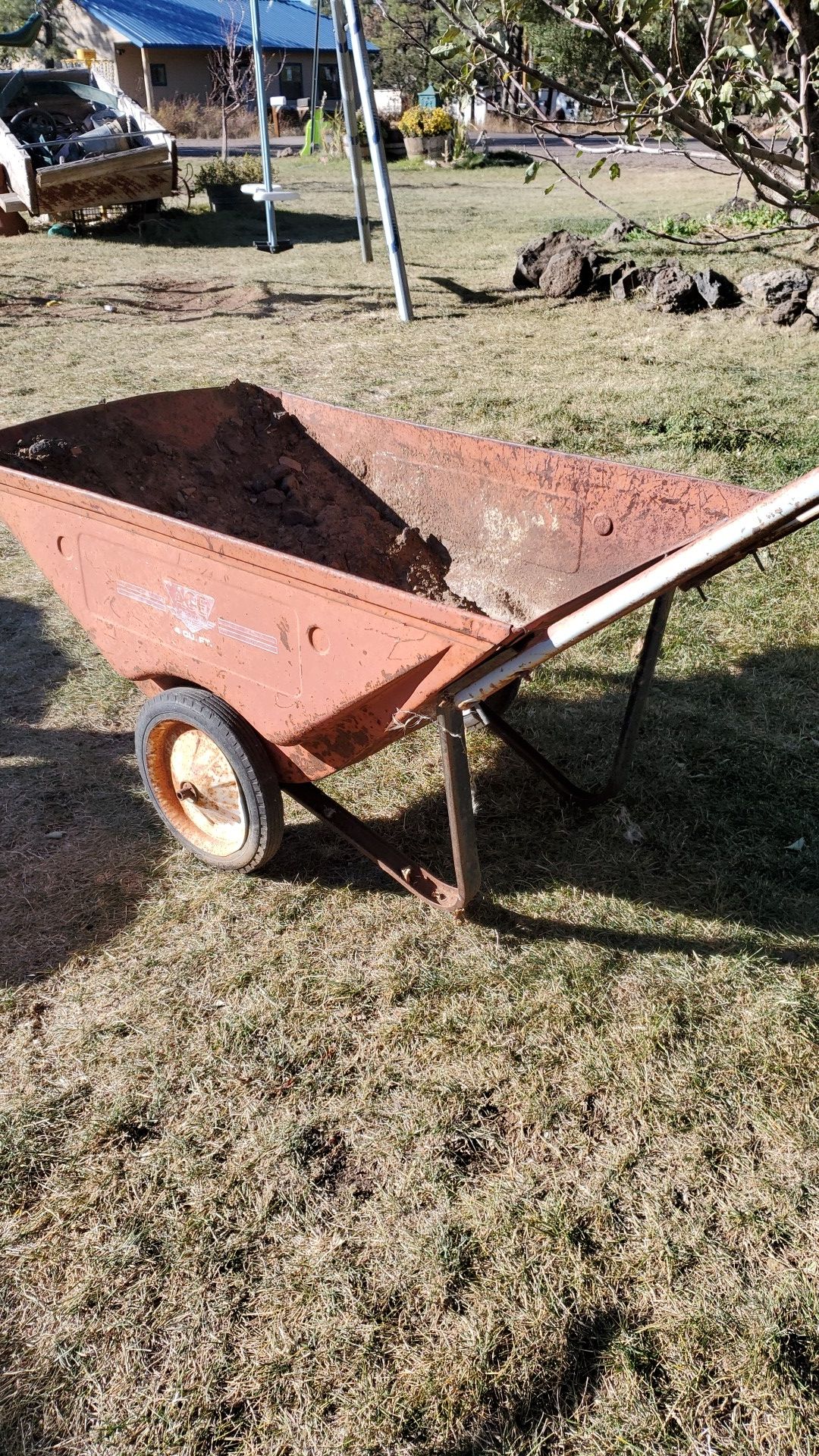 Antique ACE hardware wheel barrel