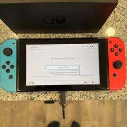 Ninentendo Switch With Original Accessories, Carrying Case, And 9 Games 