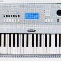 Yamaha Digital Piano DGX-230  (76-Key) with stand, power supply and sustain pedal.