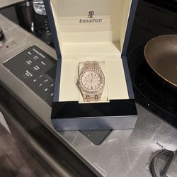 Audemars Piguet Royal Oak watch fully iced out with moissanite diamonds