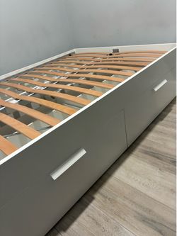 Full size bed frame with 4 drawers. Offering delivery and reassembly if needed.