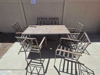 Picnic table that needs some tender love.