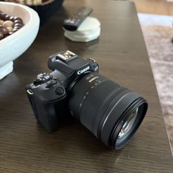 CANNON R100 + 2 LENS & BATTERY