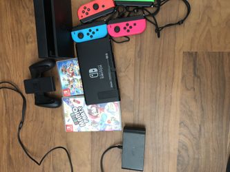 Switch and two games, four joycons, and a GameCube controller adapter