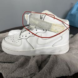 Worn Nike Air force one white mid top