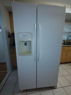 Maytag Side-by-Side Refrigerator with Ice and Water Dispenser