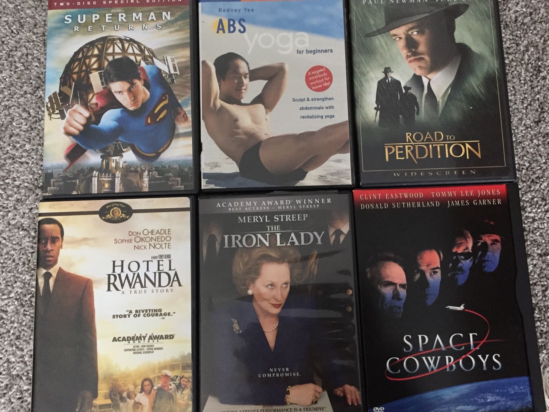 4 Set DVDs yoga, hotel rwanda, Iron Lady, road to perdition)
