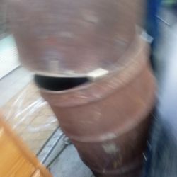 50 Gall Metal Drum And Half Of One 