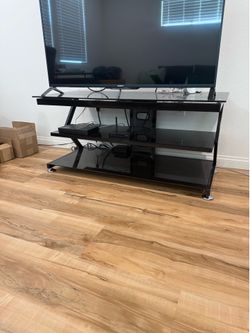 Glass TV Stand with Floating Glass Design