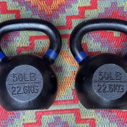 PAIR  OF  50  LB.  KETTLEBELLS 