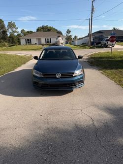 2016 Volkswagen Jetta TSI (Dark Blue, Sedan)