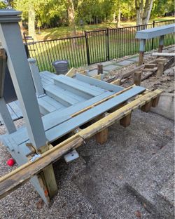 Free wooden deck/stair sections and built-in bench/seating pieces.