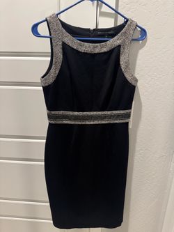 Black sheath dress with silver trim