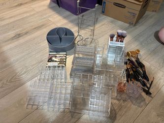 Makeup trays, holder, storage ect. Some new some used.