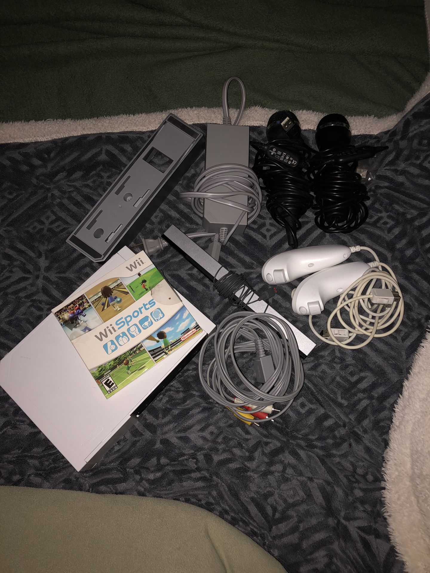 Wii console and original controllers