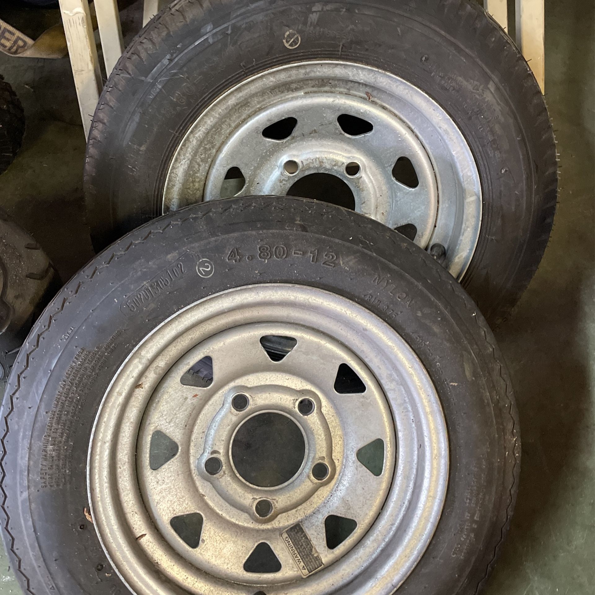 Trailer Tires 4.8 X 12. New Two. On galvanized rims.