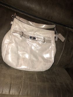 Beautiful original coach purse in good condition .