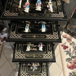 4-ASIAN BLACK LACQUERED EMBOSSED  NESTING TABLES WITH PLATED GLASS TOPS