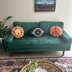 Green velvet sofas