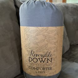 BRAND NEW TWIN 2 PIECE REVERSIBLE COMFORTER SET 1 COMFORTER, 1 SHAM. I HAVE 2 SETS $30 EACH SET