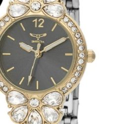 INVICTA WOMANS  ROSE GOLD WATCH