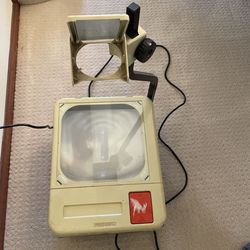 Elmo overhead projector… With brand new lamp. No lens