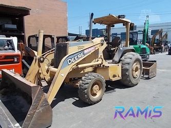 2006 Deere 210LE Skip Loader - Riverside