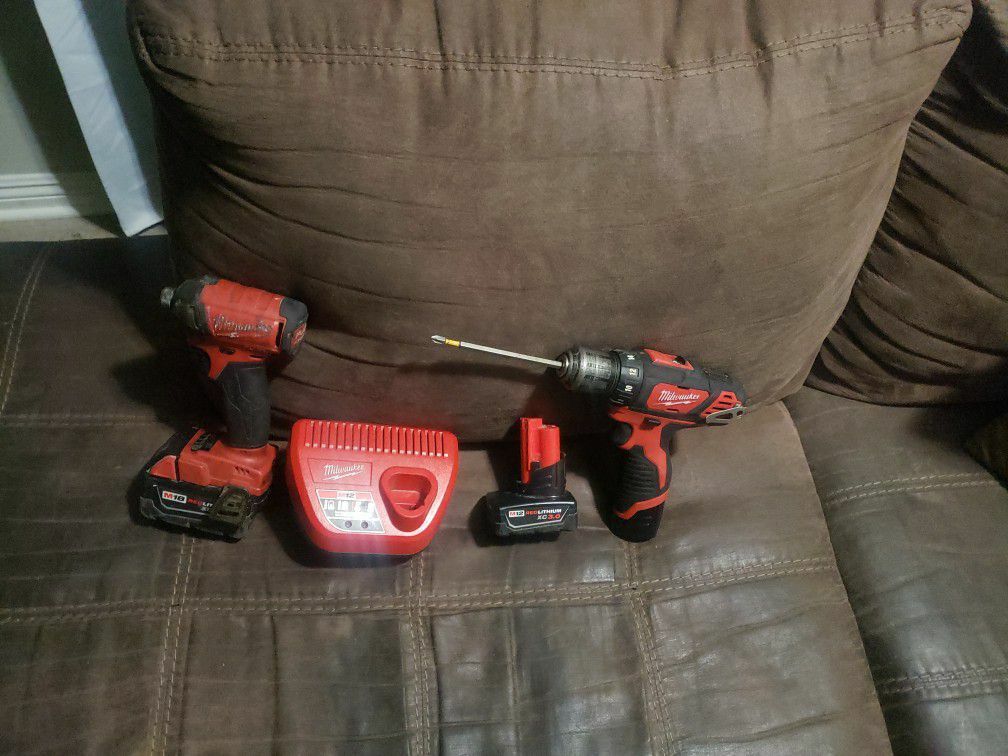 12 V Milwaukee screw gun charger was extra battery for Sale in Covina