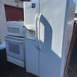 Refrigerator , Stove And Microwave.