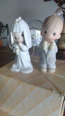 Precious Moments Bride and Groom cake toppers.