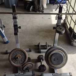 Valor fitness BD-8 racks with weights.