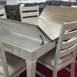 NICE STORAGE TABLE WITH 6 CHAIRS 