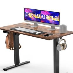 Escritorio eléctrico de pie, escritorio de pie de altura ajustable, 24 x 48 pulgadas, escritorio de oficina en casa con tablero de empalme, marco negr