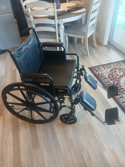 Drive Silver Sport II Wheelchair with cushion and anti-tip accessories